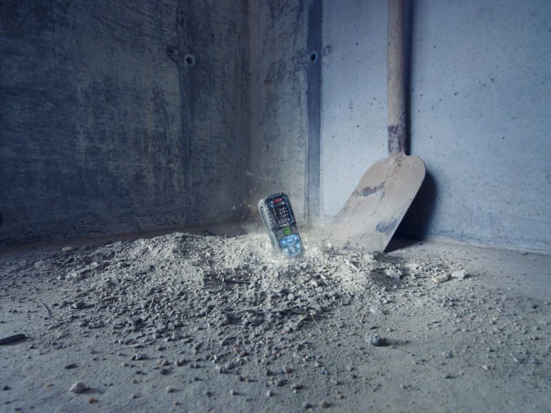 Device in dirt with shovel.