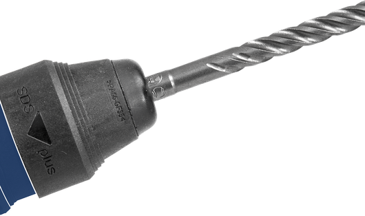 卡盤中裝有螺旋鑽頭的旋轉錘鑽。.